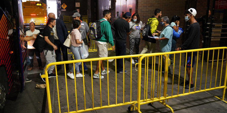 Bus carrying migrants arrives at the Port Authority terminal in New York City