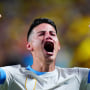 Colombia's James Rodriguez celebrates after their victory over Uruguay in a Copa America semifinal soccer match in Charlotte, N.C., Wednesday, July 10, 2024. (AP Photo/Jacob Kupferman)